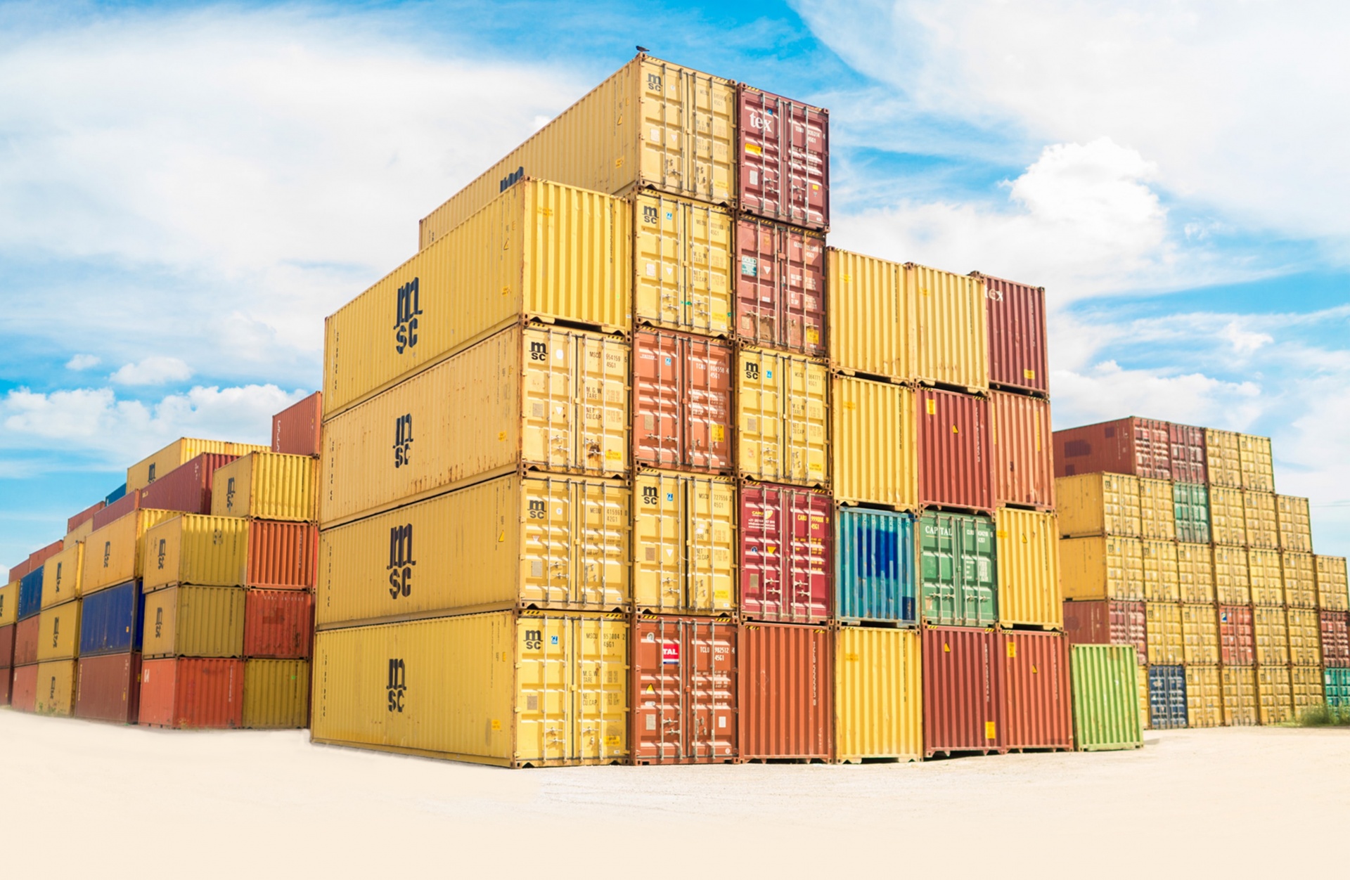 Colourful container stacks at a cargo terminal