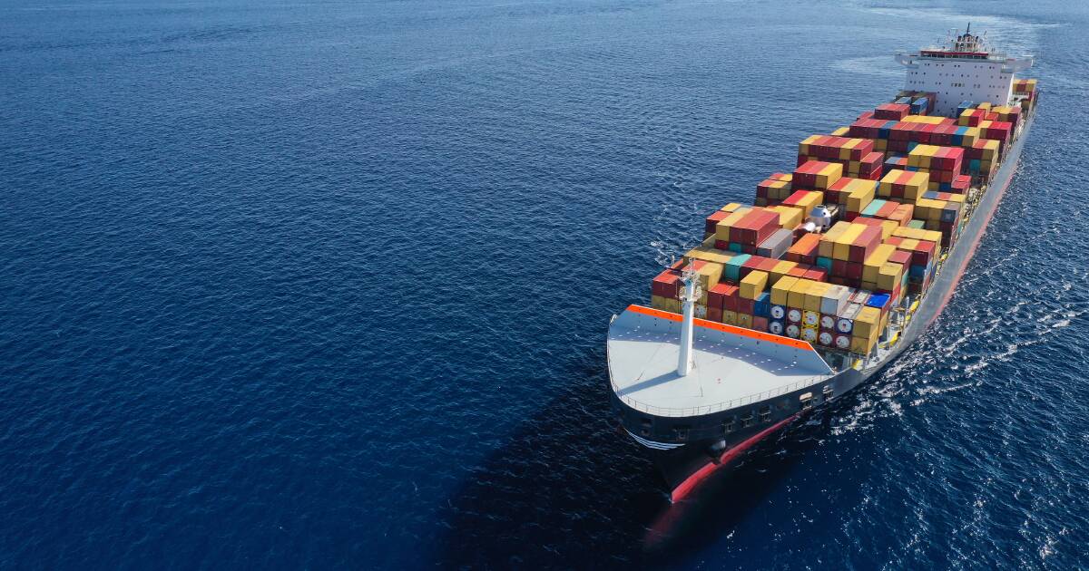 Cargo ship crossing open water