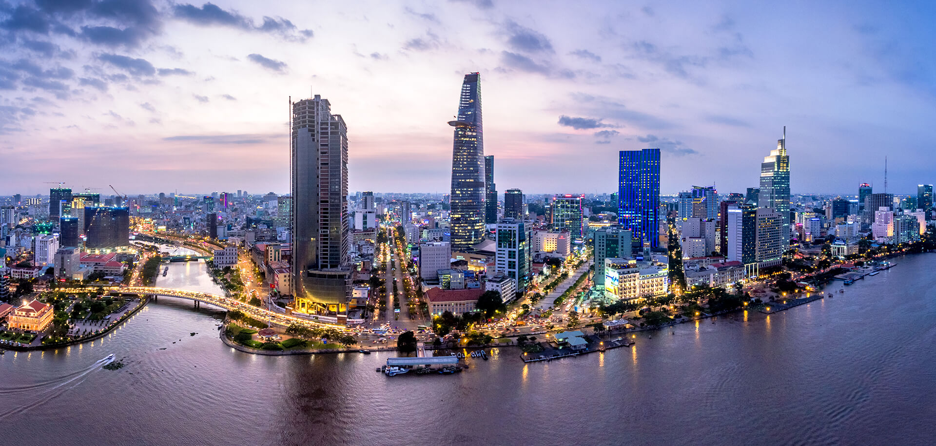 City skyline and waterfront at dusk