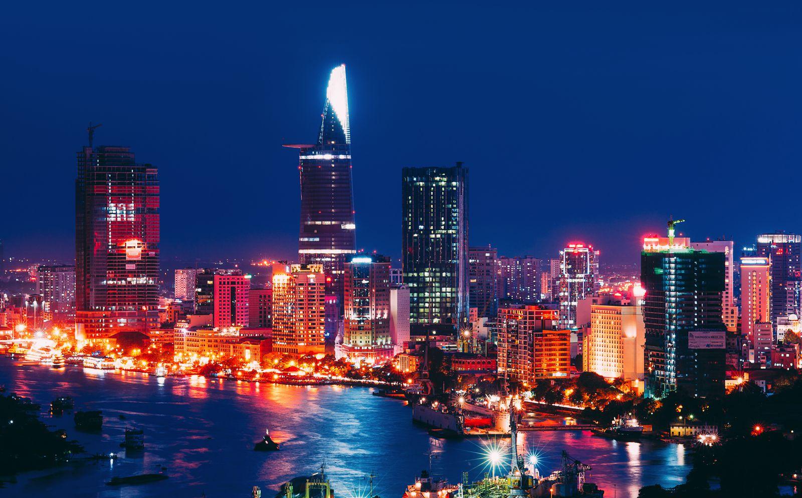 Illuminated city towers at night