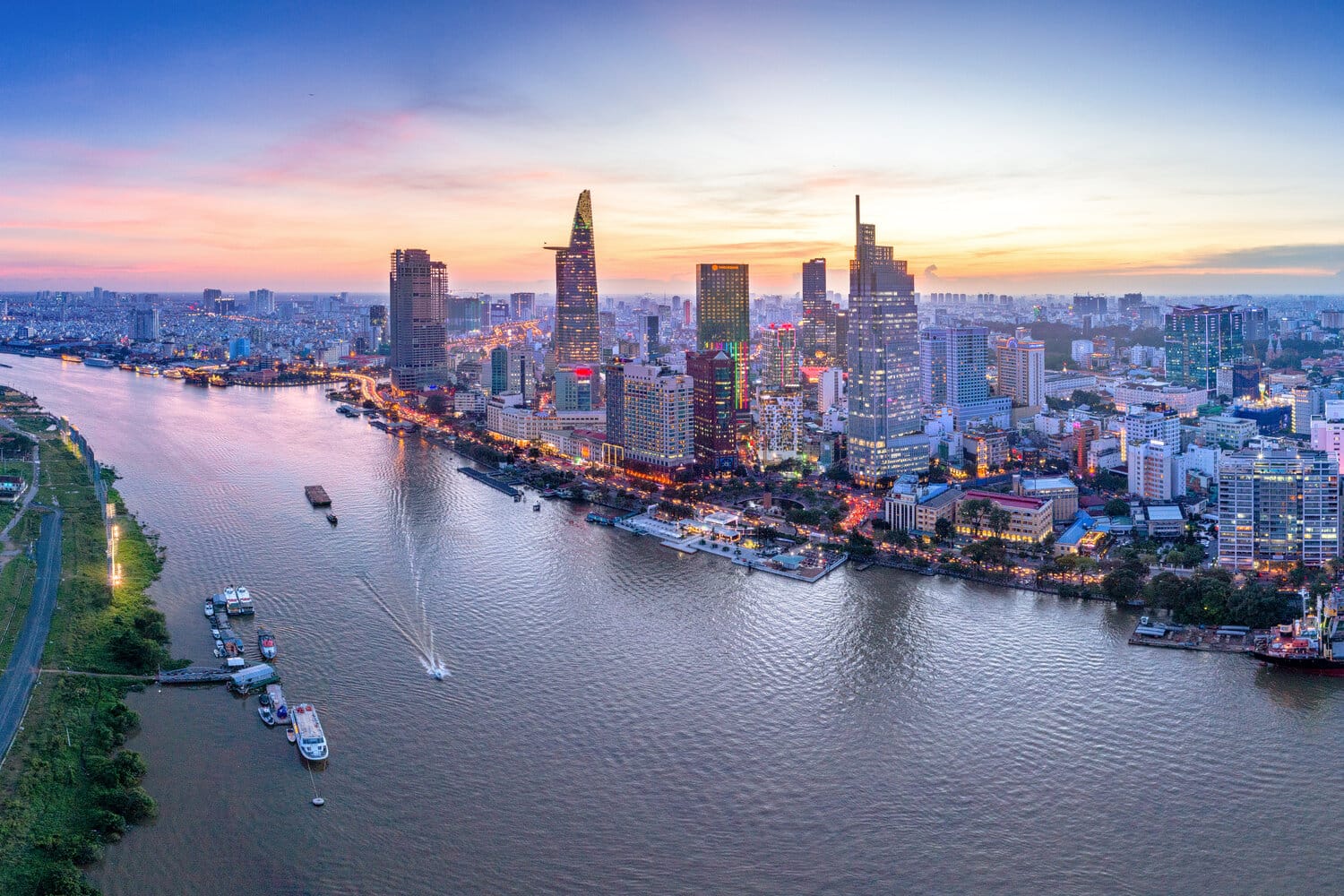 Ho Chi Minh City skyline and the Saigon River at sunset