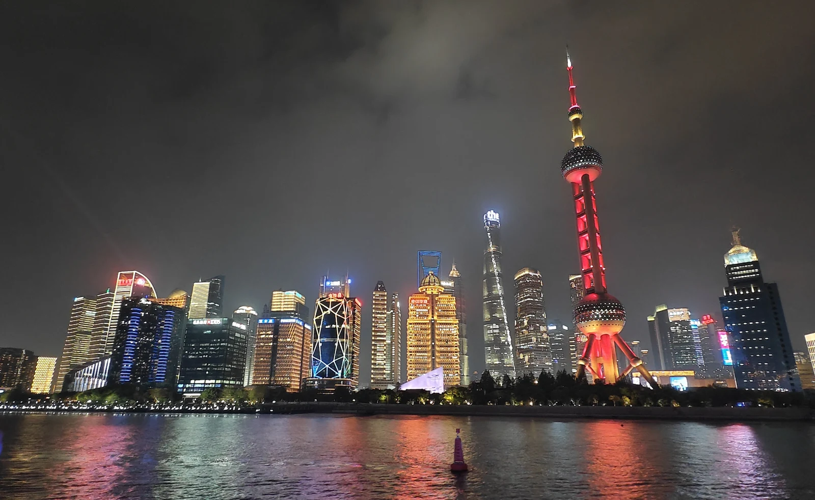 Shanghai Pudong skyline across the Huangpu River, photographed 17 April 2026